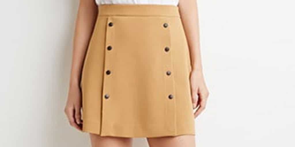 close up of tan, button front skirt
