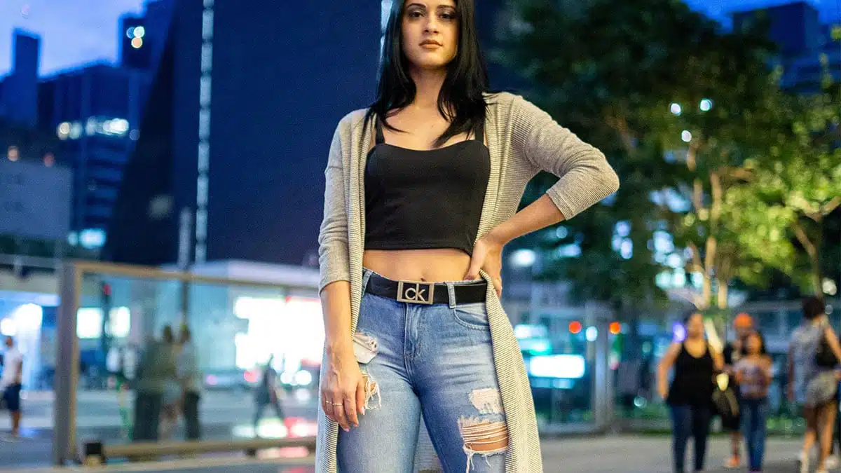 Woman wearing duster cardigan and crop top