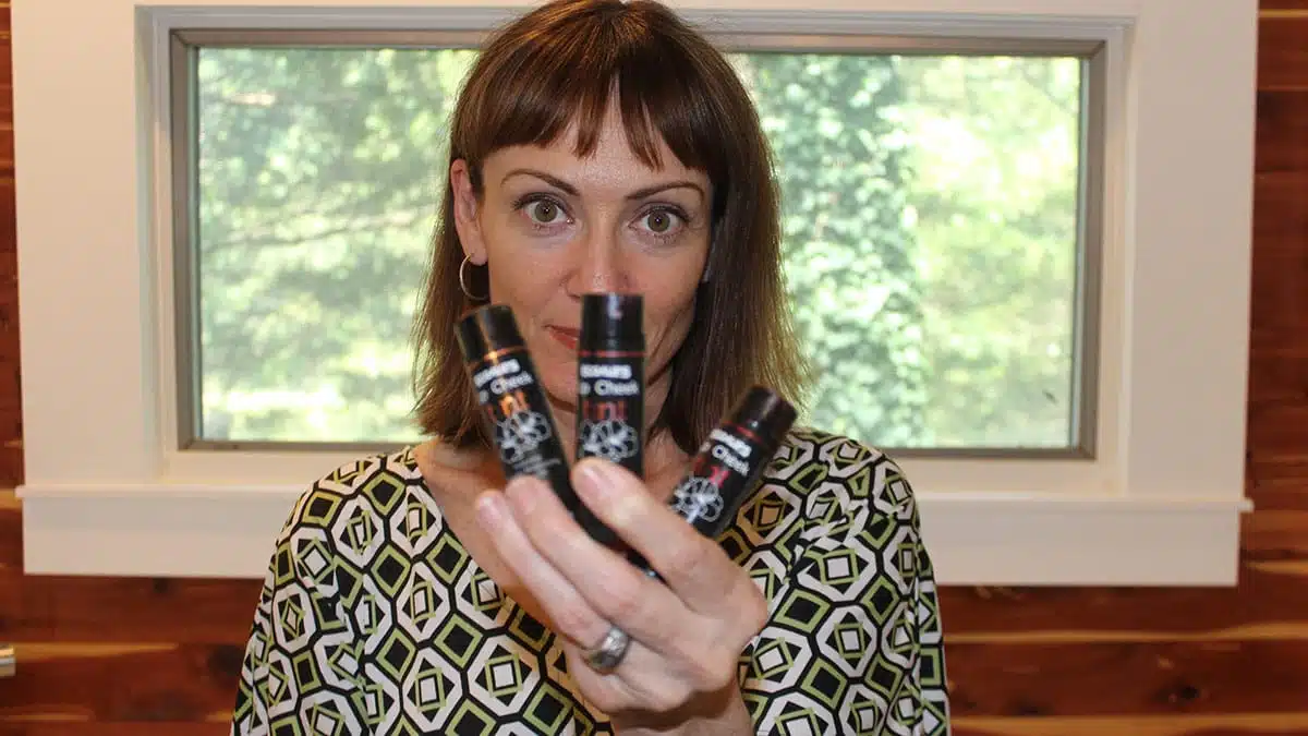 Anna Brock holding EcoLips lip and cheek tint