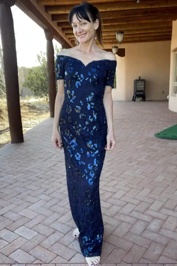 Anna Brock wearing sequined navy formal dress by Adrianna Papell, from Amazon.
