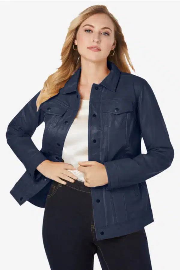 Model wears denim style leather jacket from plus-size clothing store Anna's.