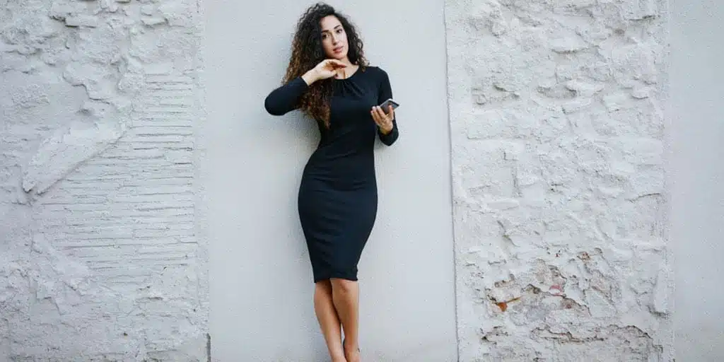 Woman wearing tight black dress